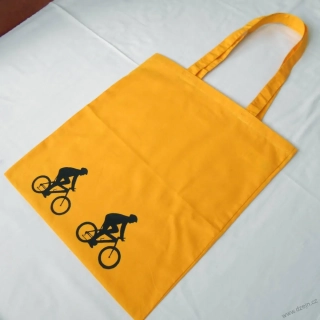 Tmavě žlutá taška s černými cyklisty